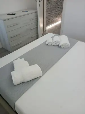 Letto o letti in una camera di Residenza Aura