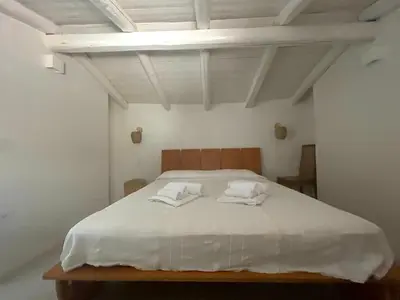 Letto o letti in una camera di Strepitoso 4 Camere da letto e Terrazza Vista Mare
