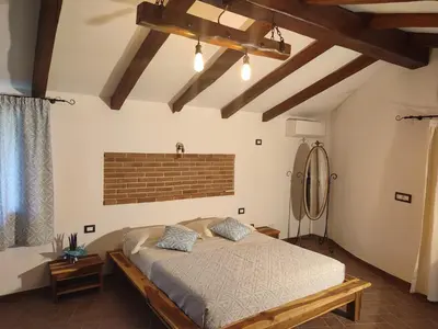 Letto o letti in una camera di Cuile Casari