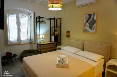Letto o letti in una camera di Eden affittacamere