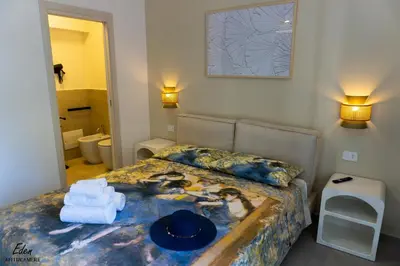 Letto o letti in una camera di Eden affittacamere