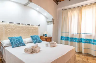 Letto o letti in una camera di PV9 by DomusAway