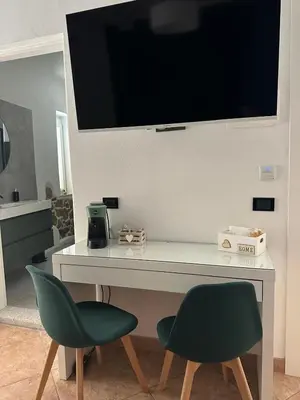 TV o dispositivi per l'intrattenimento presso Crispi Guest House MMG