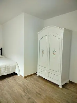 Letto o letti in una camera di Budoni Residence Lutturai 1