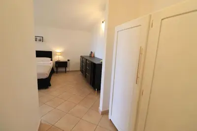 Letto o letti in una camera di Sardegna Appartamento panoramico cod IUN Q4795