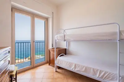 Letto o letti in una camera di Seaview House Cala Gonone
