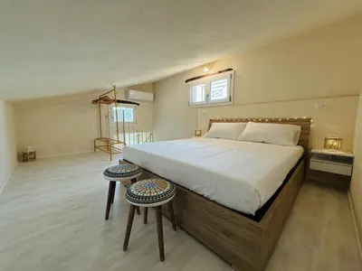 Letto o letti in una camera di Casa di campagna 'Sa Vinzedda'