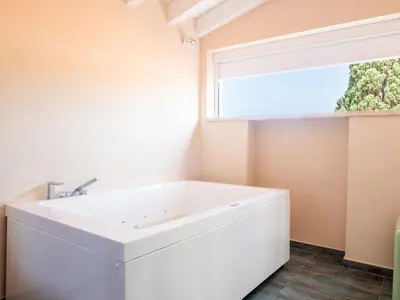 Letto o letti in una camera di I Colori dell'Isola