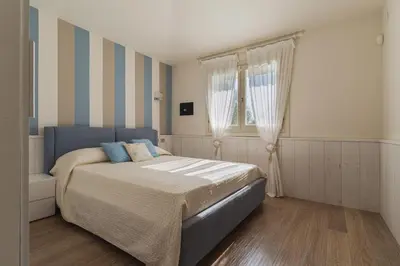 Letto o letti in una camera di Villa Blue Sphere with Pool by Wonderful Italy