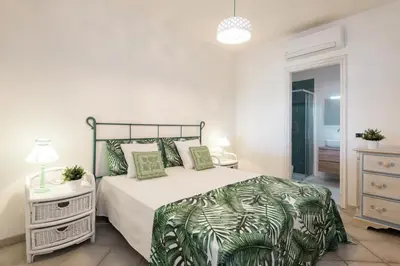 Letto o letti in una camera di S'Abba e Sa Pedra - Your House in Sardinia
