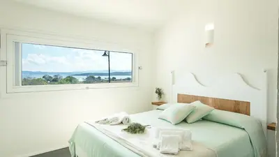 Letto o letti in una camera di Sardegna è - Beach Rooms