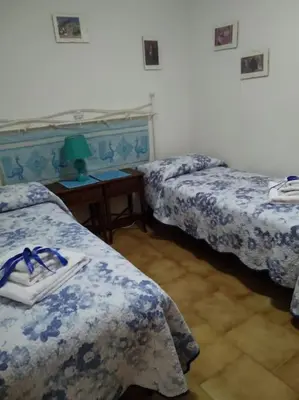 Letto o letti in una camera di Gollai House