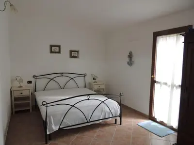 Letto o letti in una camera di Spazioso trilocale - San Lorenzo