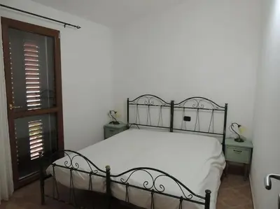 Letto o letti in una camera di Spazioso trilocale - San Lorenzo