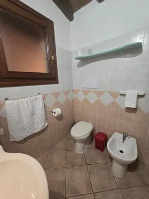 Bagno di Trilocale Climatizzato L'OLEANDRO Tanaunella