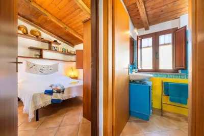 Letto o letti in una camera di Al mare a Capo Comino