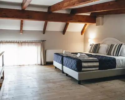 Letto o letti in una camera di Zeta Club San Teodoro Le Rose
