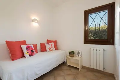 Letto o letti in una camera di Villa Ginepro