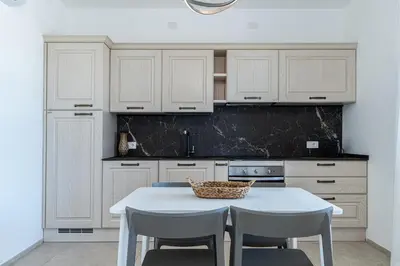Cucina o angolo cottura di Le Conchiglie Apartments with Pool by Wonderful Italy