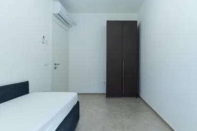 Letto o letti in una camera di Le Conchiglie Apartments with Pool by Wonderful Italy