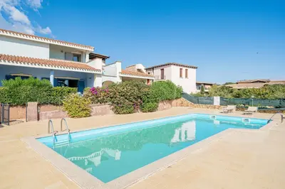 Piscina di ISA-Residence with swimming-pool in Cala Girgolu, apartments with private outdoor area o nelle vicinanze