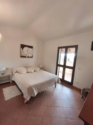 Letto o letti in una camera di Le Villette di Lu Fraili