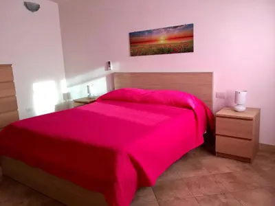 Letto o letti in una camera di Villetta Saba