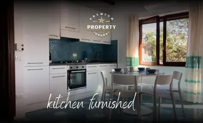 Cucina o angolo cottura di Beach houseI 2 bdr I Cala Girgolu I parking