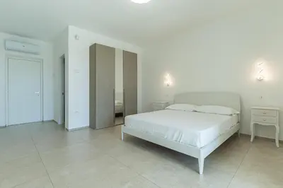 Letto o letti in una camera di Villa Infinity with Pool by Wonderful Italy