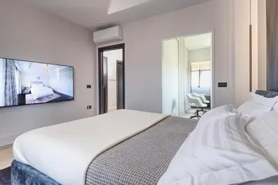 Letto o letti in una camera di Elegant NEW luxe 2BR AZULIS apartment#7 - big terrace - smart check-in - FREE secure parking