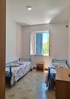 Letto o letti in una camera di Casa Celeste