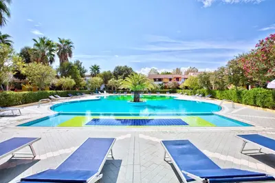 Piscina di Residence with swimming-pool in Ottiolu just 250 mt from the sea o nelle vicinanze