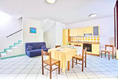 Cucina o angolo cottura di Residence with swimming-pool in Ottiolu just 250 mt from the sea