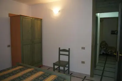 Letto o letti in una camera di Casa Luminosa