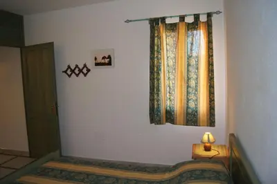 Letto o letti in una camera di Casa Luminosa