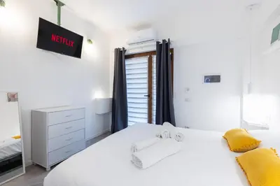 Letto o letti in una camera di Urban Rooms