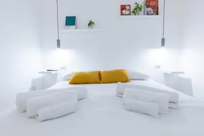 Letto o letti in una camera di Urban Rooms