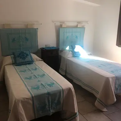 Letto o letti in una camera di NicChia Turchese