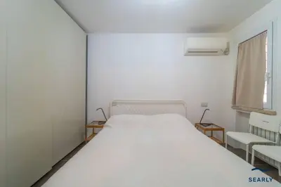 Letto o letti in una camera di Villa Nuraghe - By Searly
