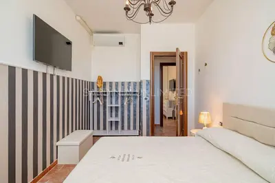 Letto o letti in una camera di Villa I Venti di Molara