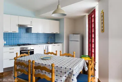 Cucina o angolo cottura di Hotiday Apartments Case Bianche