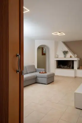 Area soggiorno di Casa Al Borgo by Wonderful Italy