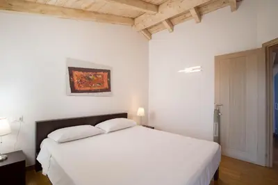 Letto o letti in una camera di Casa Al Borgo by Wonderful Italy