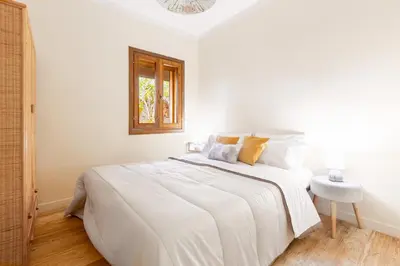 Letto o letti in una camera di NOVITA' Dimora Delfino - Spiaggia Privata, WIFI, AC