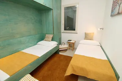 Letto o letti in una camera di Alba Apartment