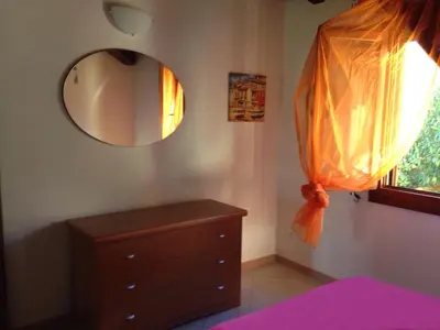 Letto o letti in una camera di Casa Magnolia