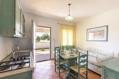 Cucina o angolo cottura di Apartments In Golfo Orosei
