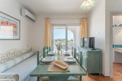 TV o dispositivi per l'intrattenimento presso Apartments In Golfo Orosei