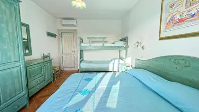 Letto o letti in una camera di Apartments In Golfo Orosei