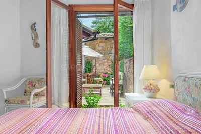 Letto o letti in una camera di Villa Beth